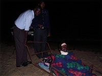 Patient getting ready for trip across Lake Malawi